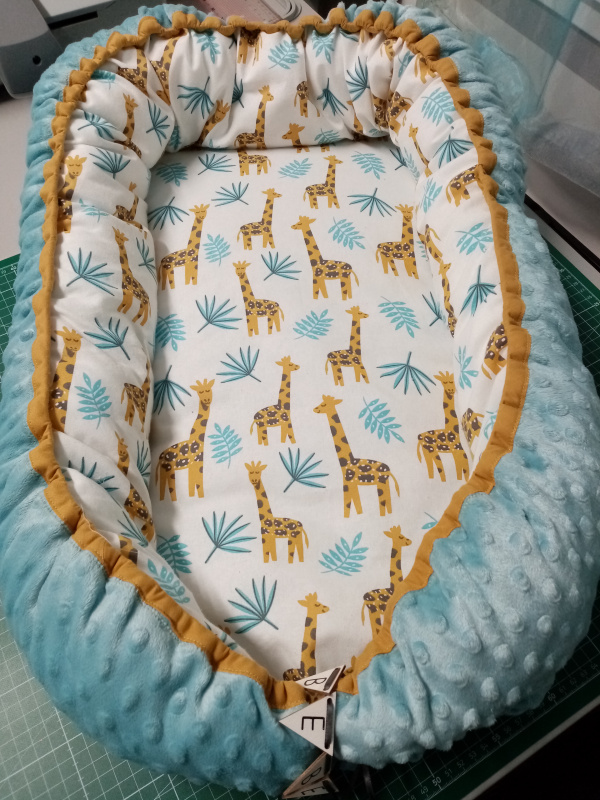 Nid/Couffin réducteur de lit bébé girafe
