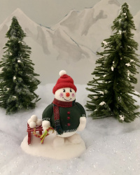 Bonhomme de neige avec luge